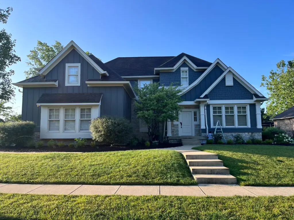 Two-story home exterior repainted by AltaVista Painting Pro near Westfield, Indiana