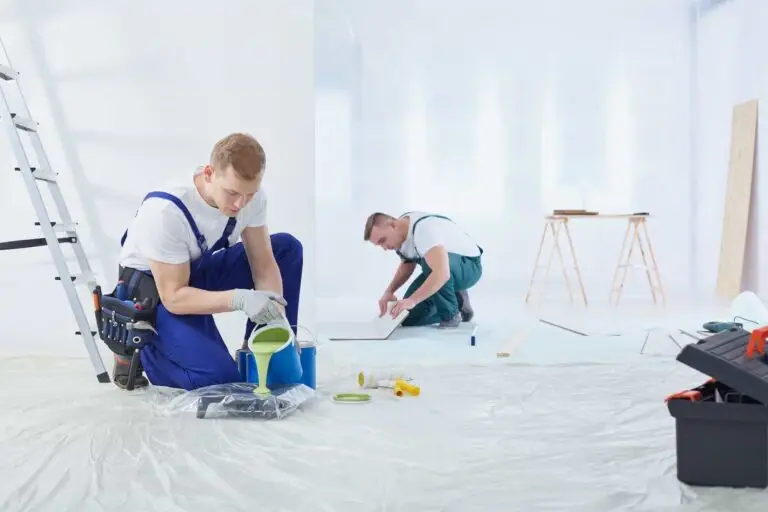 How to prep walls for painting – professional painters smoothing and prepping a wall before painting in Carmel, Indiana