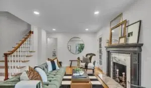 Contemporary home office in Carmel, IN, brought to life by AltaVista Painting Pro’s interior painting, tells a tale of modern elegance with bold charcoal walls and precise finishes, using durable, eco-friendly paints.