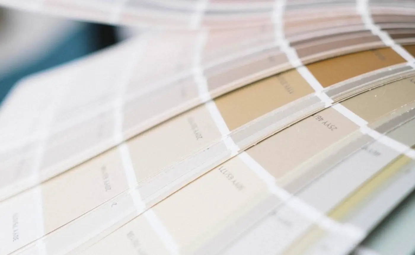 Fanned paint color swatches used to choose exterior paint colors