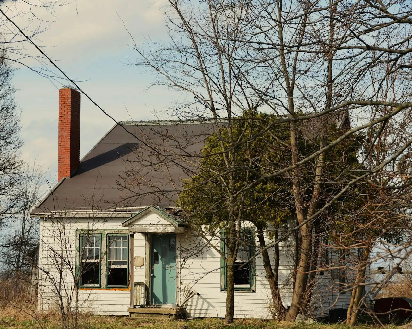 Charming white brick cottage exterior — limewashed brick home style